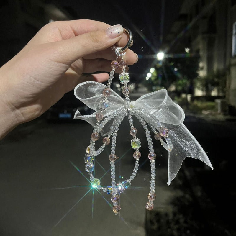 Designer Pearl Phone Strap with Lucky Bow & Rhinestone Chain – Cute Elegant Wrist Lanyard for Phones, AirPods & Keychains