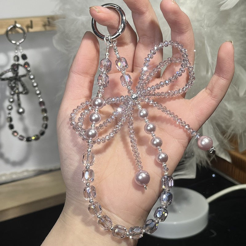 Designer Pearl Phone Strap with Lucky Bow & Rhinestone Chain – Cute Elegant Wrist Lanyard for Phones, AirPods & Keychains