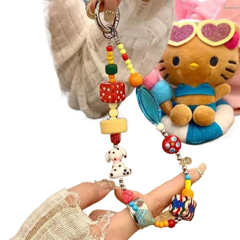 Dopamine phone charm with colorful beads. Cute multi-use strap for phone, bag, or camera. A joyful, trendy accessory for aesthetic lovers.