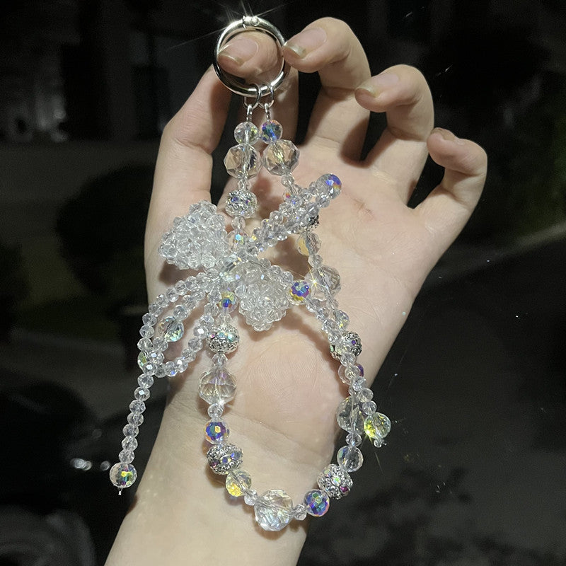 Designer Pearl Phone Strap with Lucky Bow & Rhinestone Chain – Cute Elegant Wrist Lanyard for Phones, AirPods & Keychains