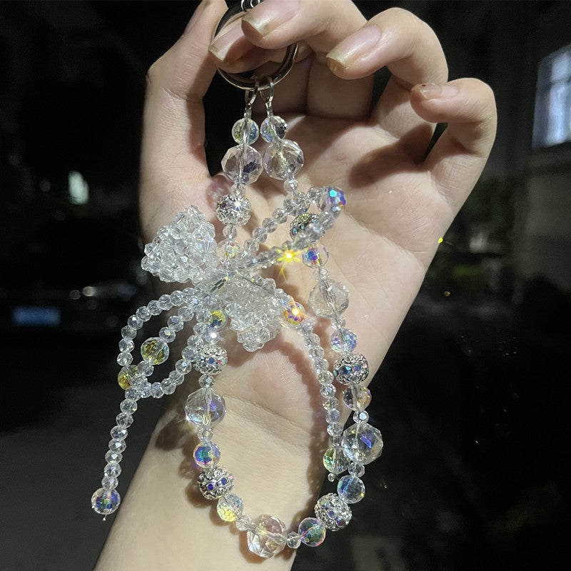 Designer Pearl Phone Strap with Lucky Bow & Rhinestone Chain – Cute Elegant Wrist Lanyard for Phones, AirPods & Keychains