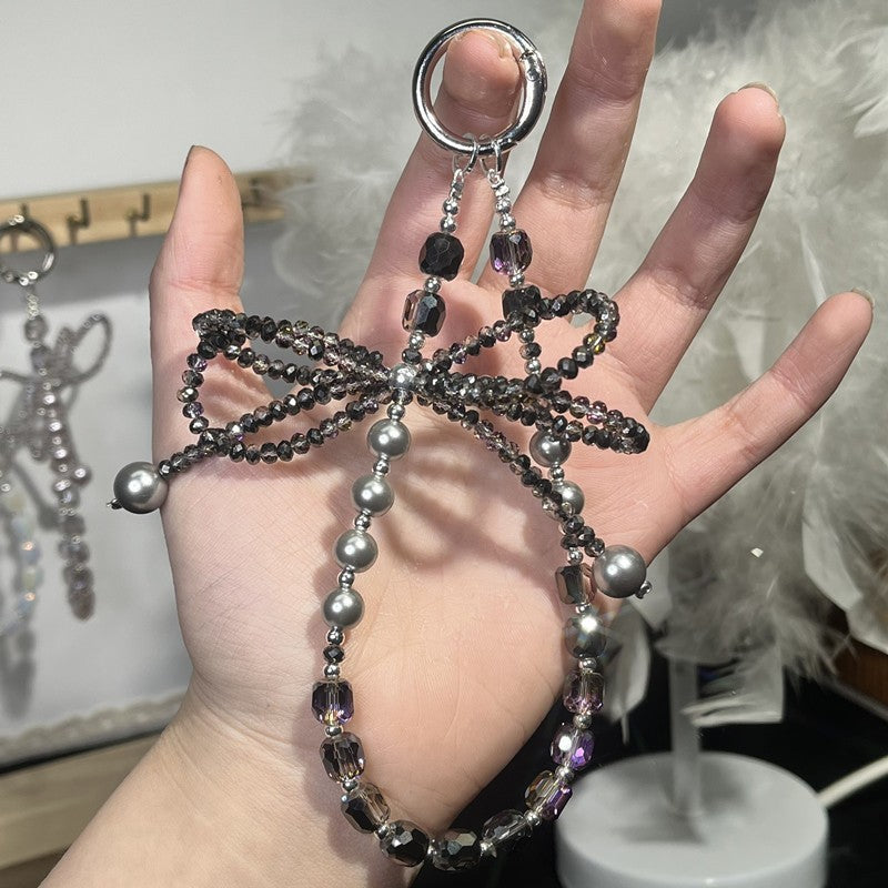 Designer Pearl Phone Strap with Lucky Bow & Rhinestone Chain – Cute Elegant Wrist Lanyard for Phones, AirPods & Keychains