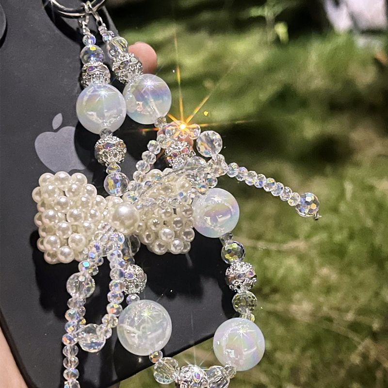 Designer Pearl Phone Strap with Lucky Bow & Rhinestone Chain – Cute Elegant Wrist Lanyard for Phones, AirPods & Keychains